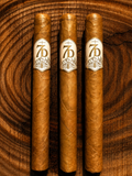 Temperance cigar by Seven Devils Cigars with an ivory and gold band